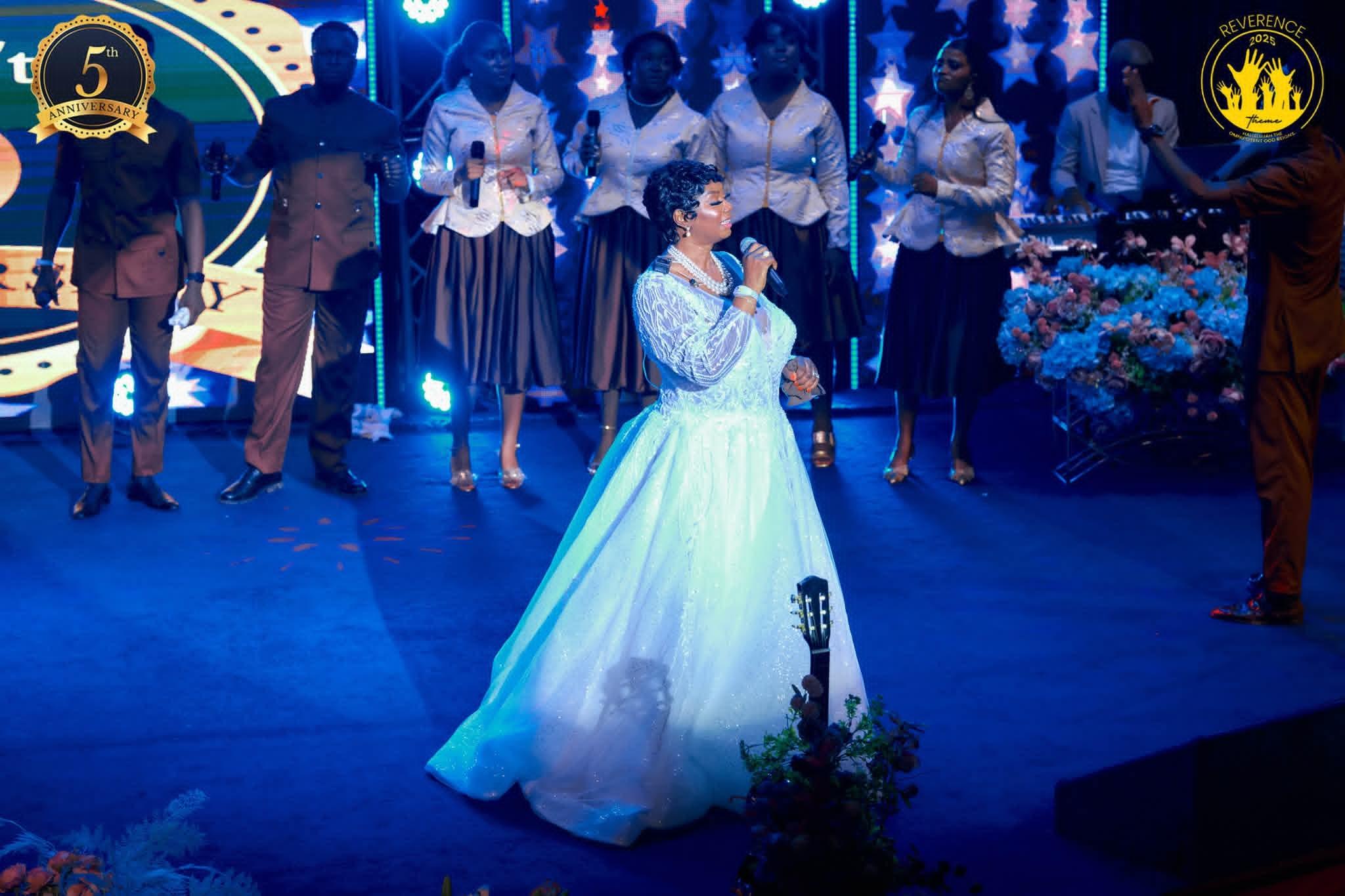 Worship leader ministering on stage